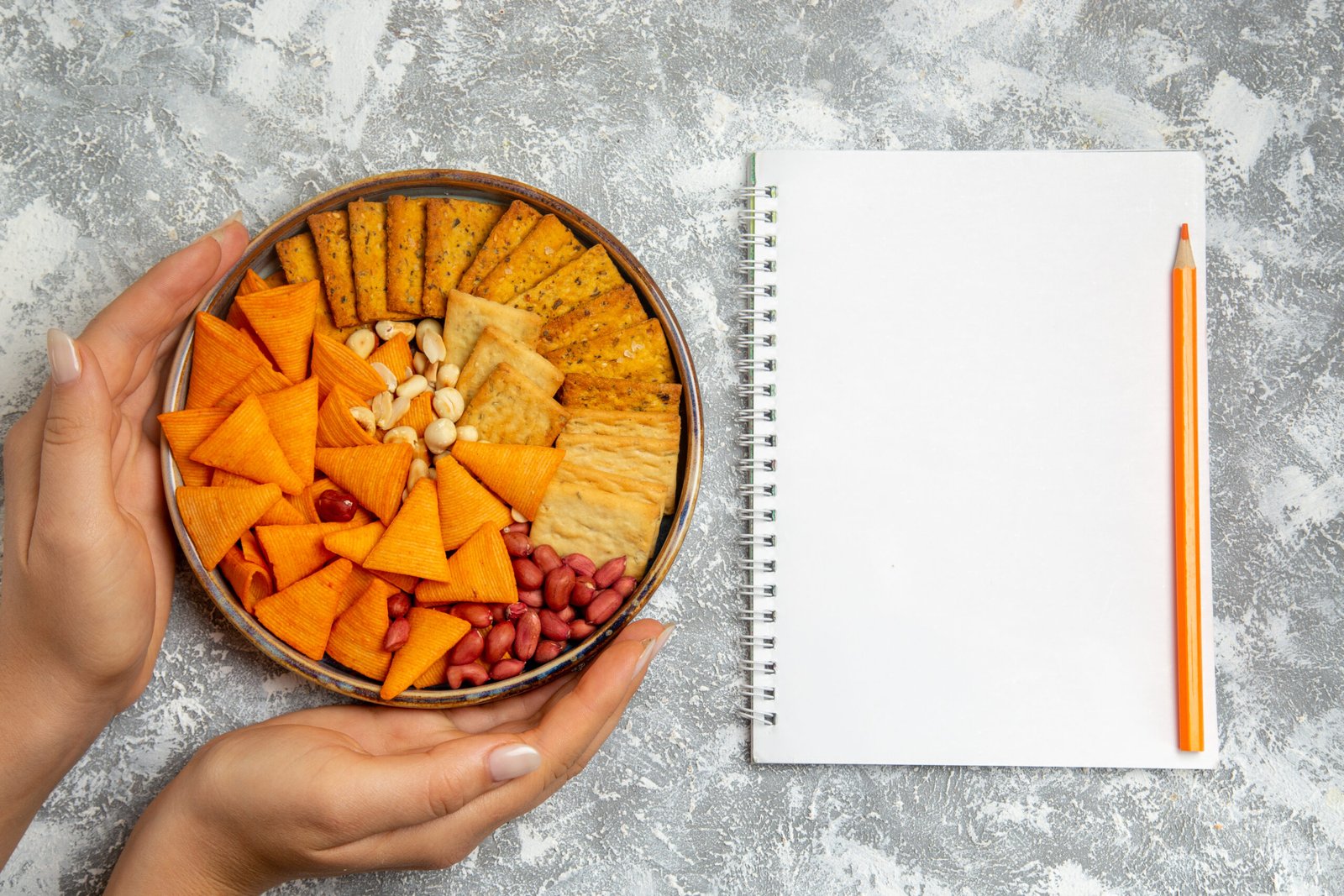 top-view-crackers-composition-different-salted-cracker-snacks-with-nuts-white-background-crisp-cracker-snack-food